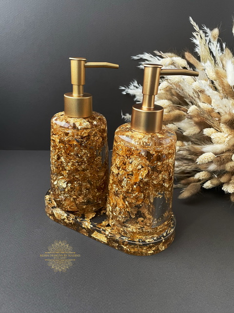 Two gold soap dispensers with Matt gold pumps