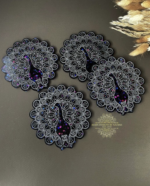 Black and silver peacock coasters