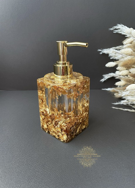 Gold soap dispenser with a gold pump