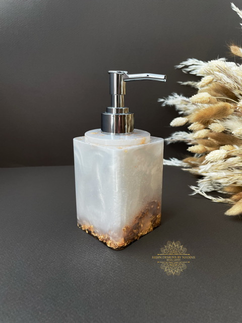 Pearl soap dispenser with a silver pump