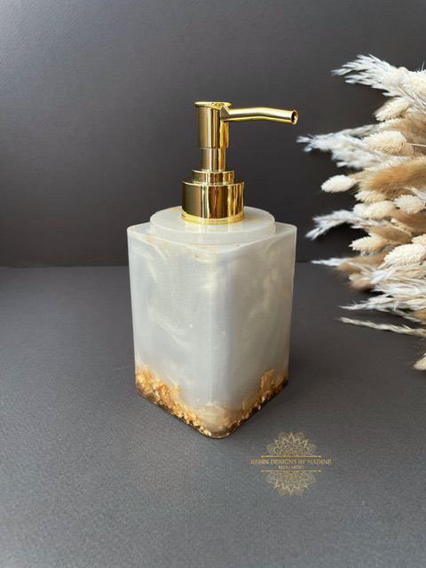 Gold soap dispenser with a gold pump