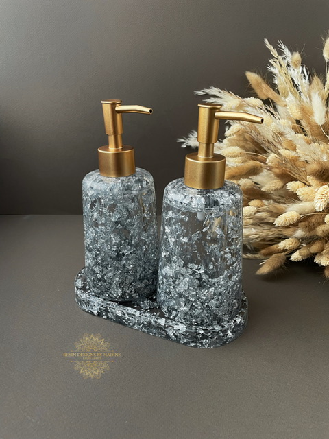 Silver soap dispenser and gold pump