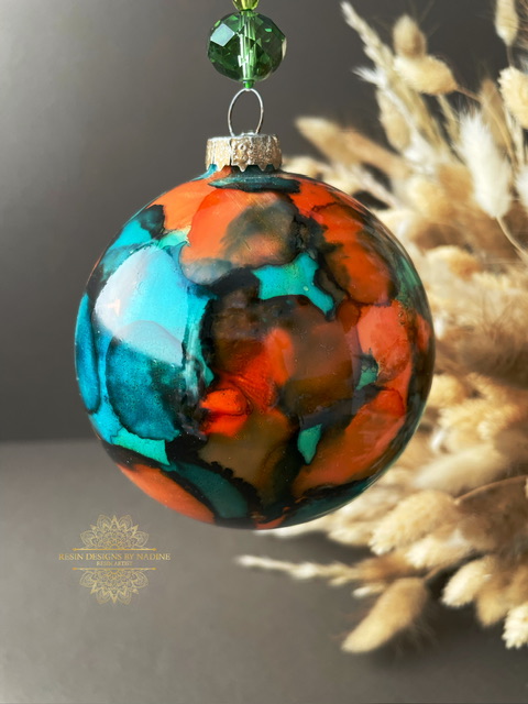 Large orange and blue glass bauble